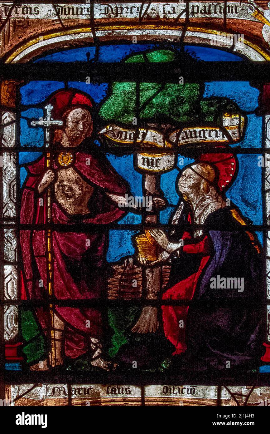 Risen from the dead ... following his Resurrection, Jesus appears to his female disciple, Mary Magdalene - but warns her not to touch him: detail of colourful 16th century Renaissance stained glass window in the village church at Ceffonds, in the Champagne region of northeast France, made by master glassmakers in nearby Troyes. Stock Photo