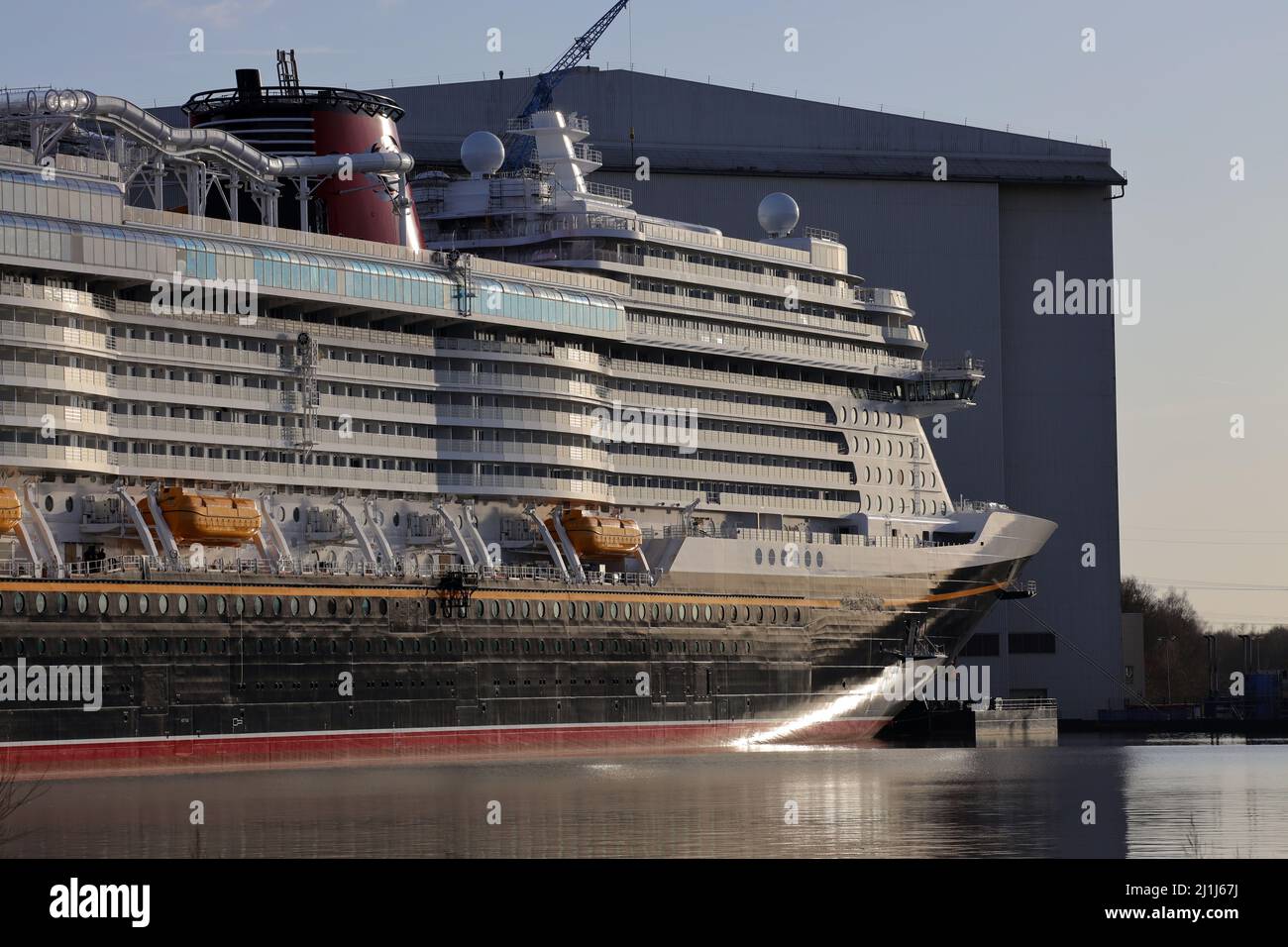 The Disney Wish cruise ship is moored in front of the Meyer shipyard in Papenburg on February 26, 2022. Stock Photo