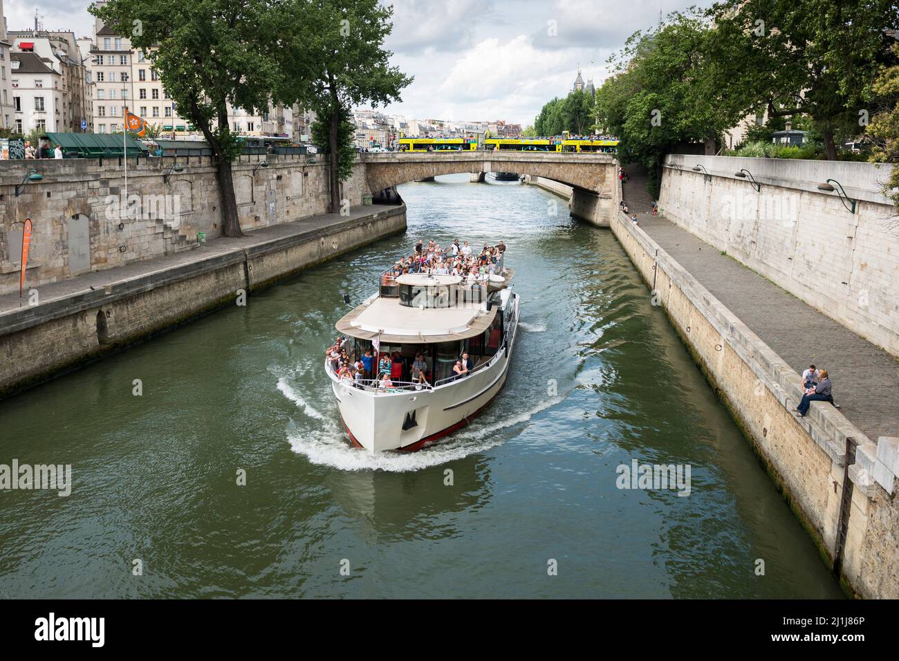 Seine River Cruise near Petit-Pont-Cardinal-Lustiger, Ile-de-France, Paris, France Stock Photo