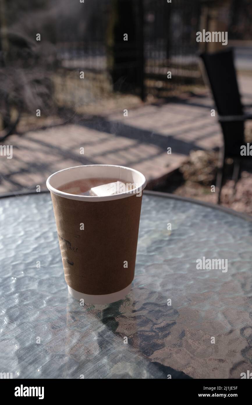 Paper coffee cup in coffee shop Stock Photo - Alamy