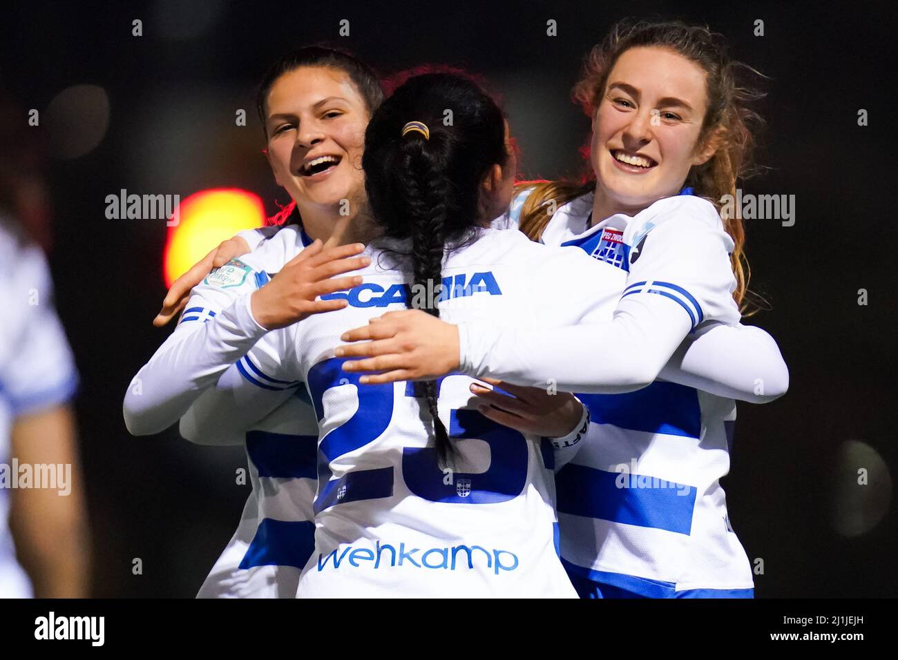 Zwolle, Netherlands. 25th Mar, 2022. ZWOLLE, NETHERLANDS - MARCH 25:  Danique Noordman of PEC Zwolle, Karlene White of PEC Zwolle and Jeva Walk  of PEC Zwolle celebrate their sides win during the