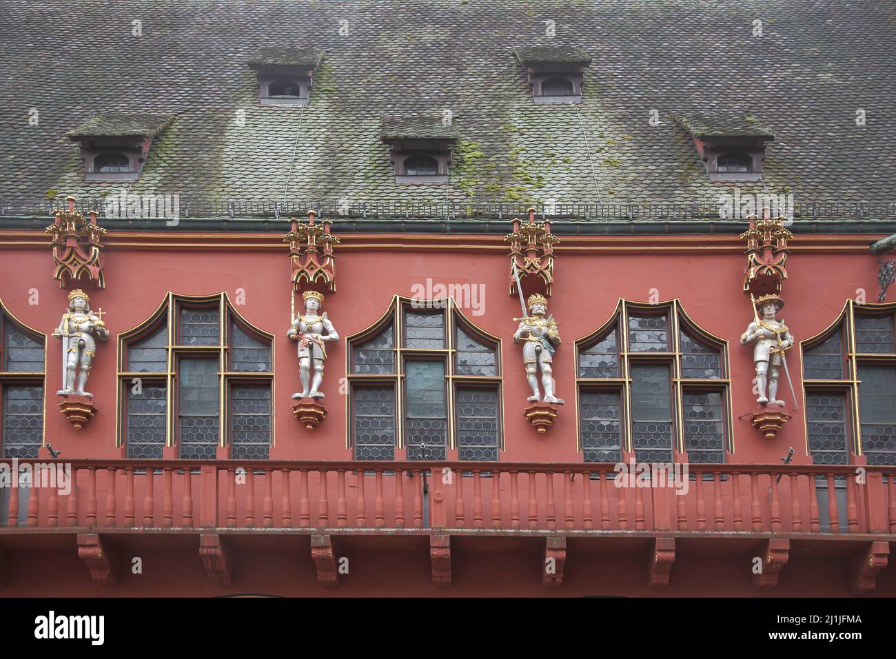 Balcony with figures at the historic department store in Freiburg, Baden-Württemberg, Germany Stock Photo