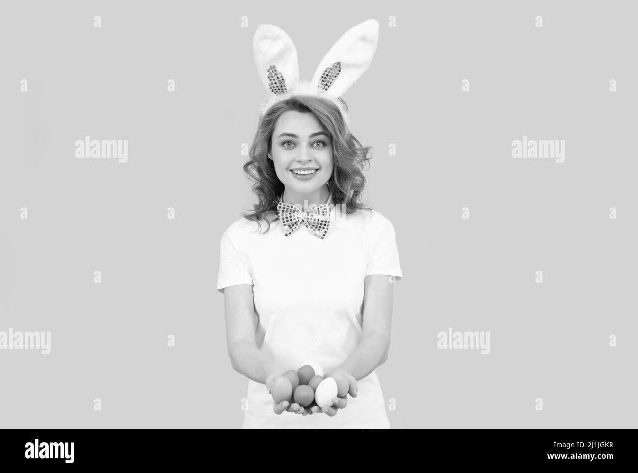 Easter vibes. woman in rabbit ears and bow tie. time for fun. egg hunt. adorable lady looking funny Stock Photo