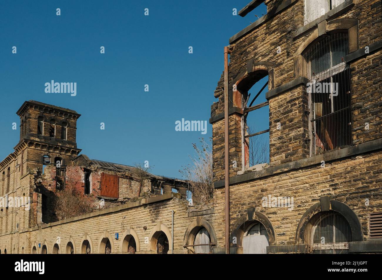 Keighley, West Yorkshire, UK. The remains of Dalton Mills after a big fire in March 2022. Dalton Mills. Stock Photo