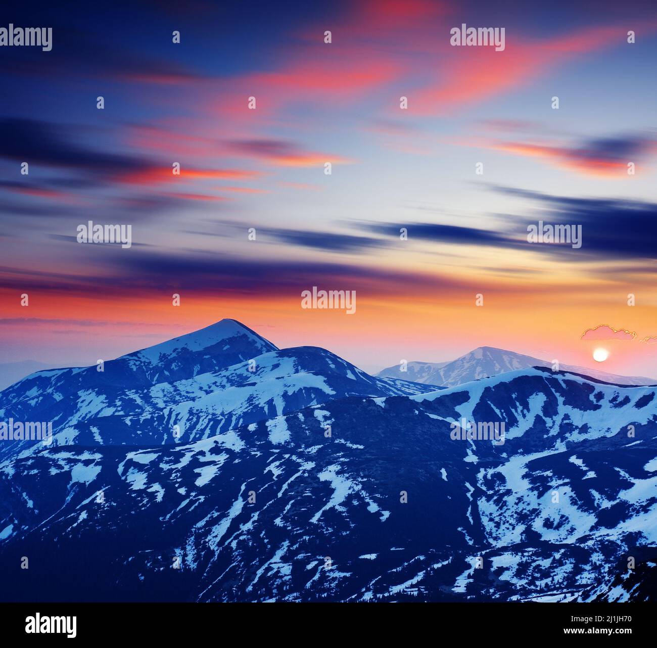 Majestic sunset in the mountains landscape. HDR image Stock Photo - Alamy
