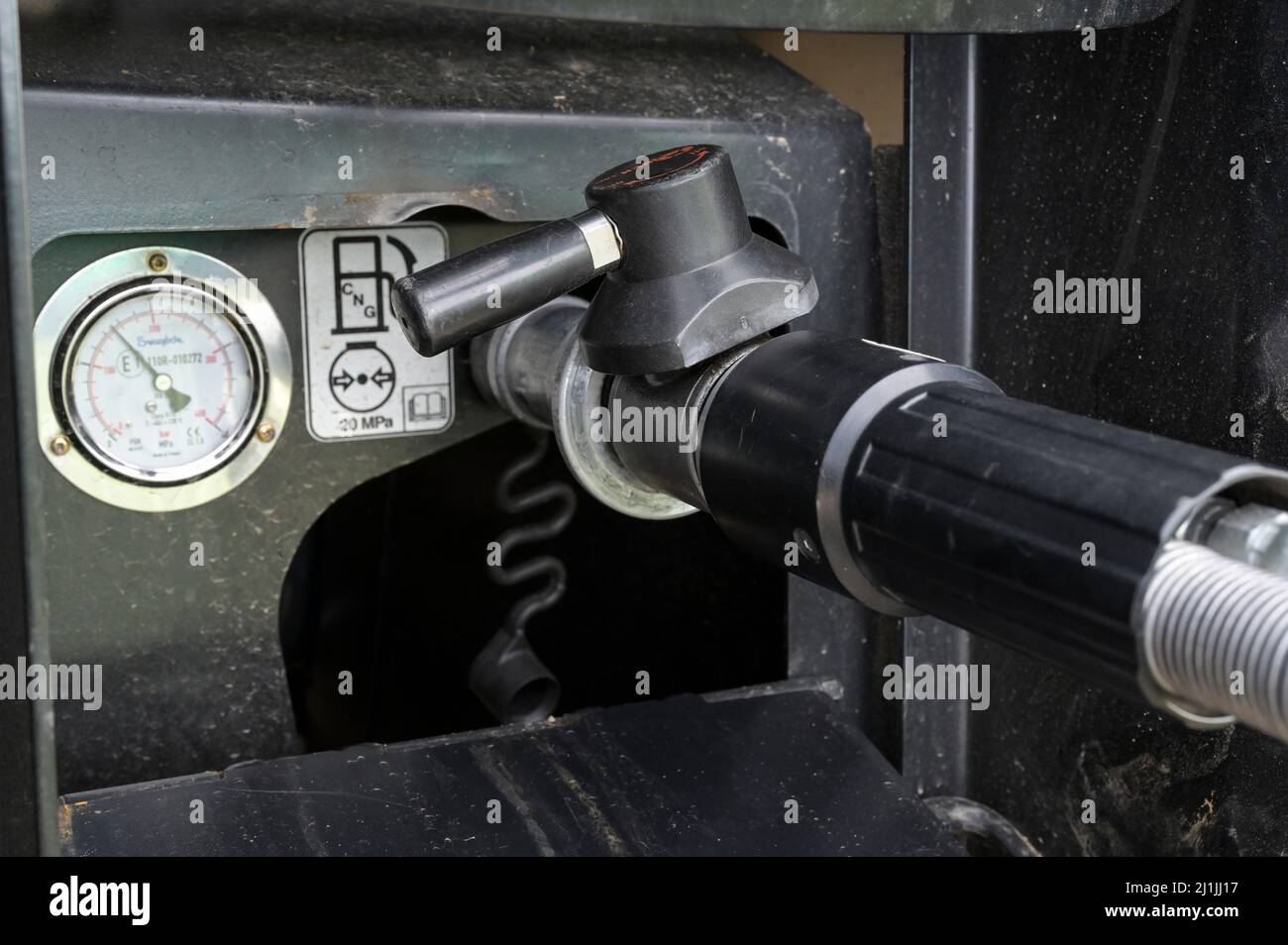 Zapfpistole mit Knoten im Schlauch, seitlich Stock Photo - Alamy