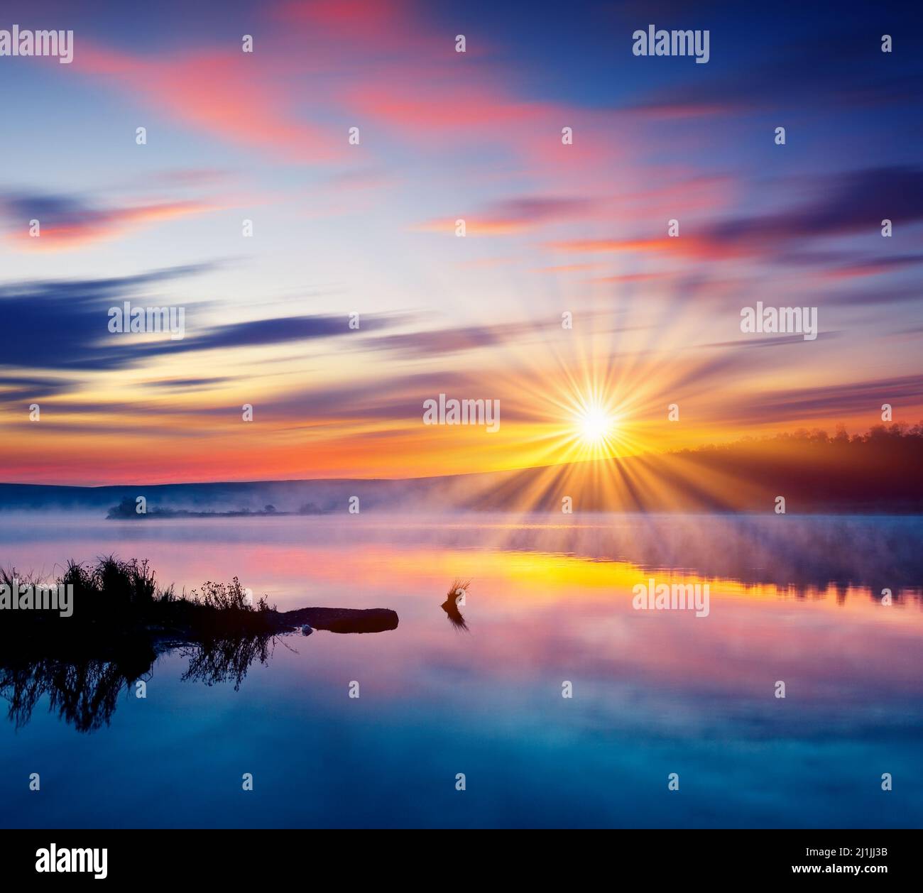 Beautiful summer sunset in the lake. HDR image Stock Photo - Alamy