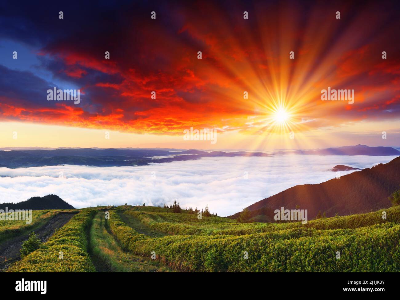 Landscape with mountains under morning sky with clouds Stock Photo - Alamy