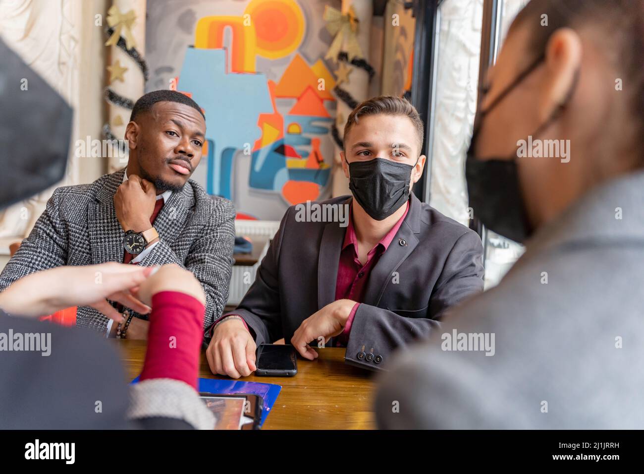Group of multiracial business people are having a meeting about the ...