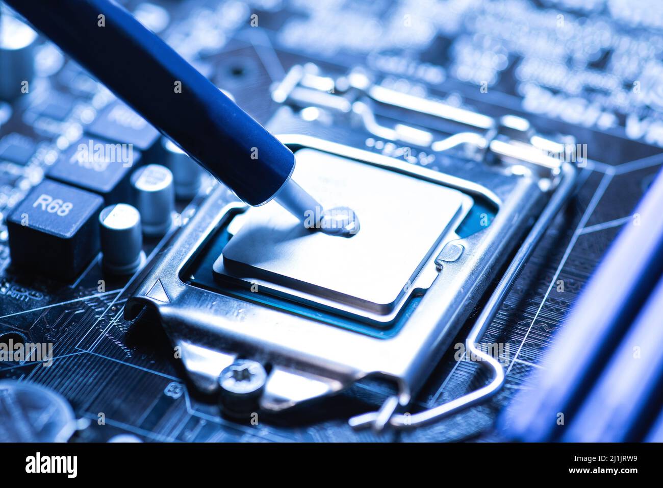 Thermal compound for the CPU in the PC Stock Photo Alamy