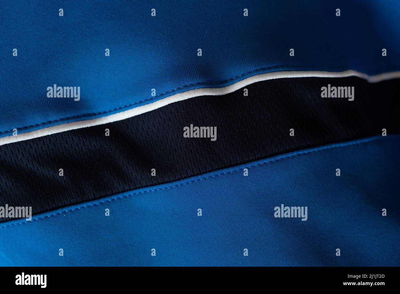 Close-up of blue black and white polyester fabric. Stock Photo