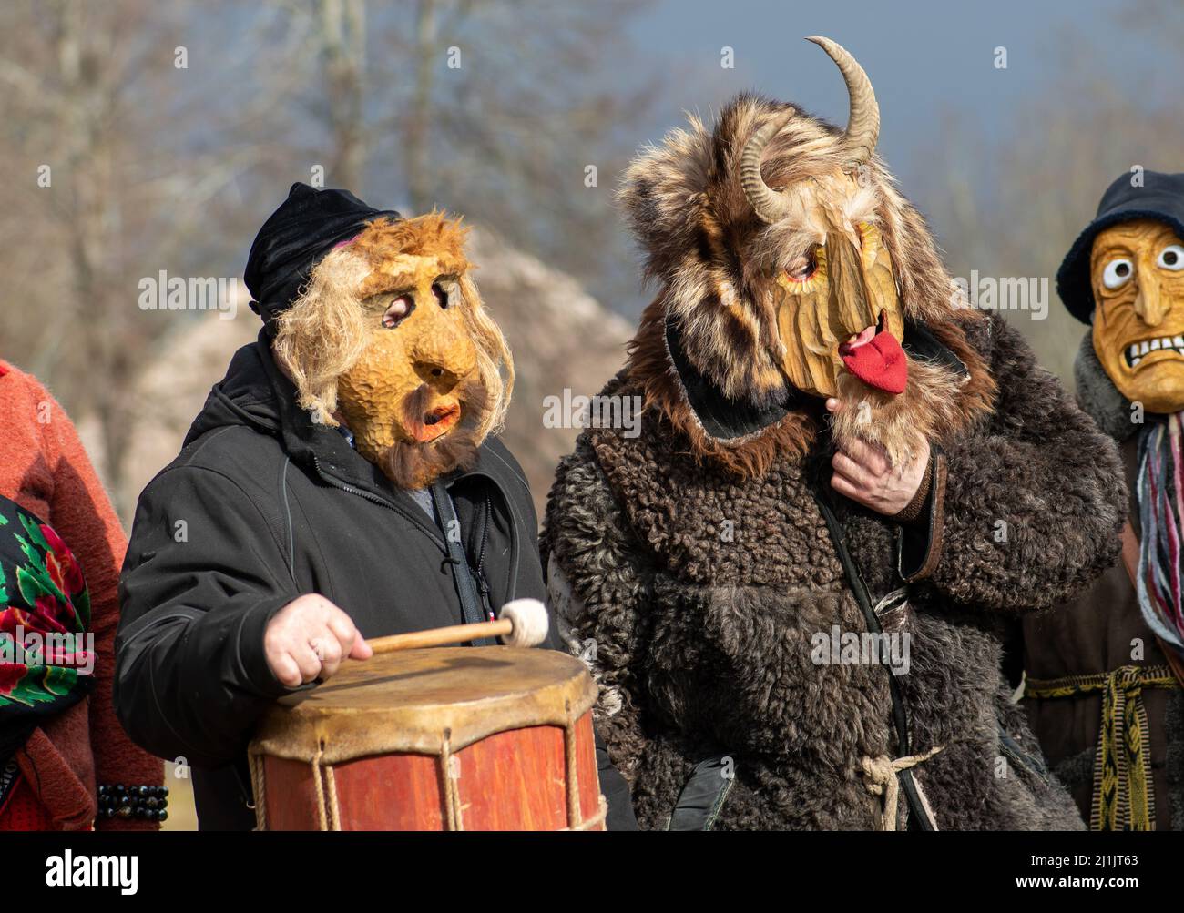 Rumsiskes, Lithuania - February 26 2022: Traditional masks in Rumsiskes, Lithuania during Uzgavenes, a Lithuanian folk festival during carnival Stock Photo