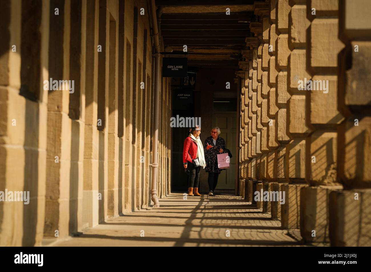 Halifax, West Yorkshire, UK. Shoppers at The Piece Hall. Stock Photo