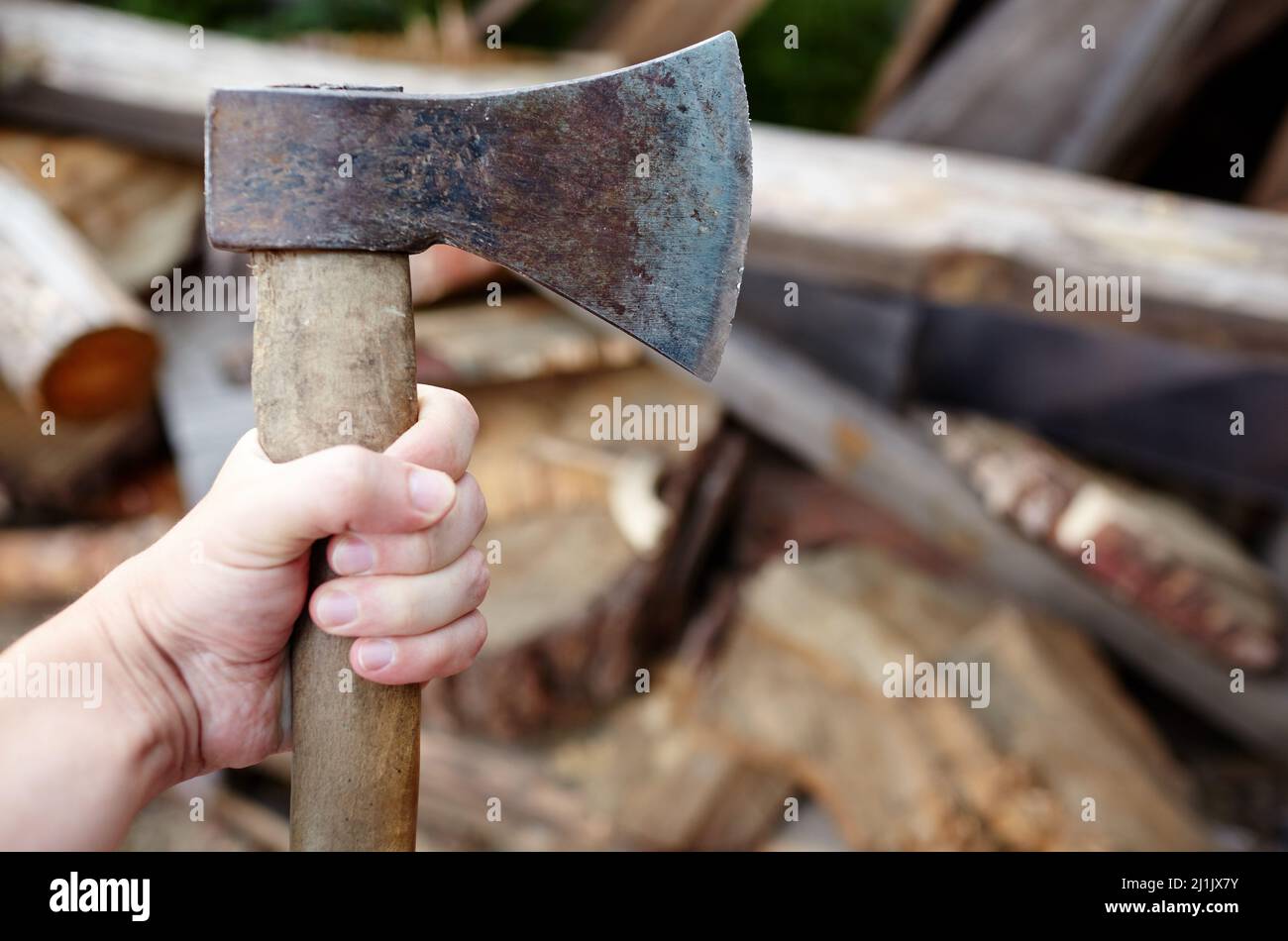 A Rugged Hand Holding an Axe Ina Firm Grip. Stock Image - Image of closeup,  fire: 106779465