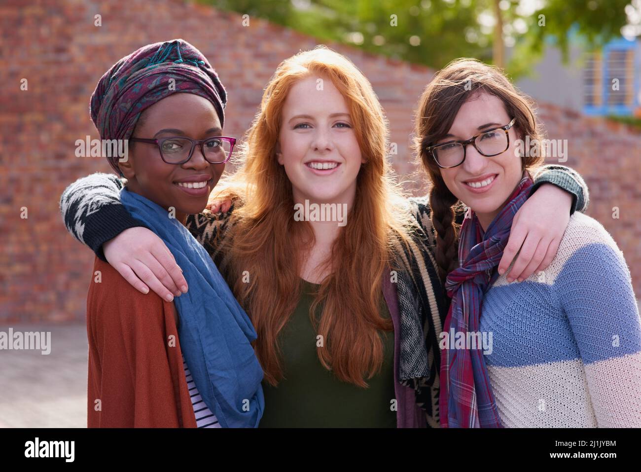 Enjoying campus life. Portrait of a group of university students on campus. Stock Photo