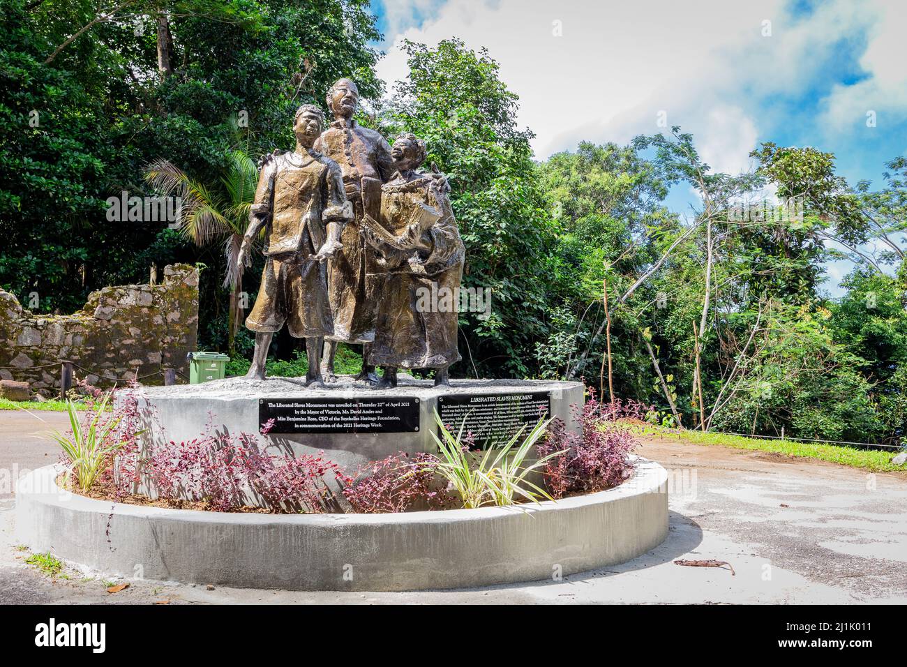 Mahe, Seychelles, 3.05.2021. The Liberated Slave Monument depicting three sculpted statues of two Liberated Slave children and a Headmaster. Stock Photo