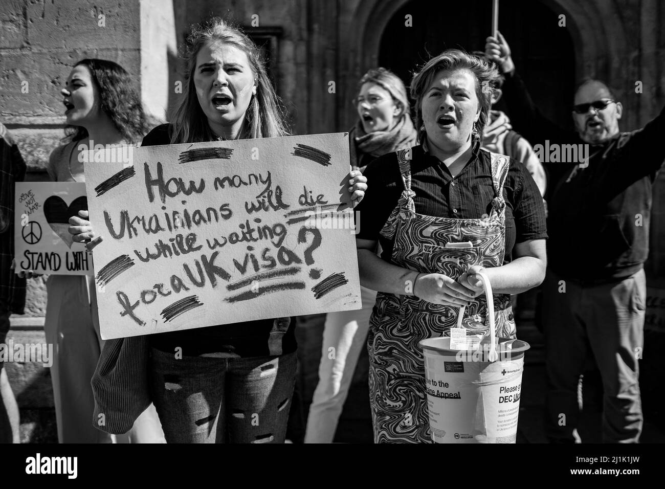 Protesters outside Bath Abbey in the UK city of Bath during a Ukraine ...