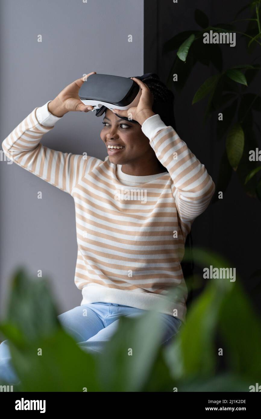 Curious joyful black woman hi-res stock photography and images - Alamy