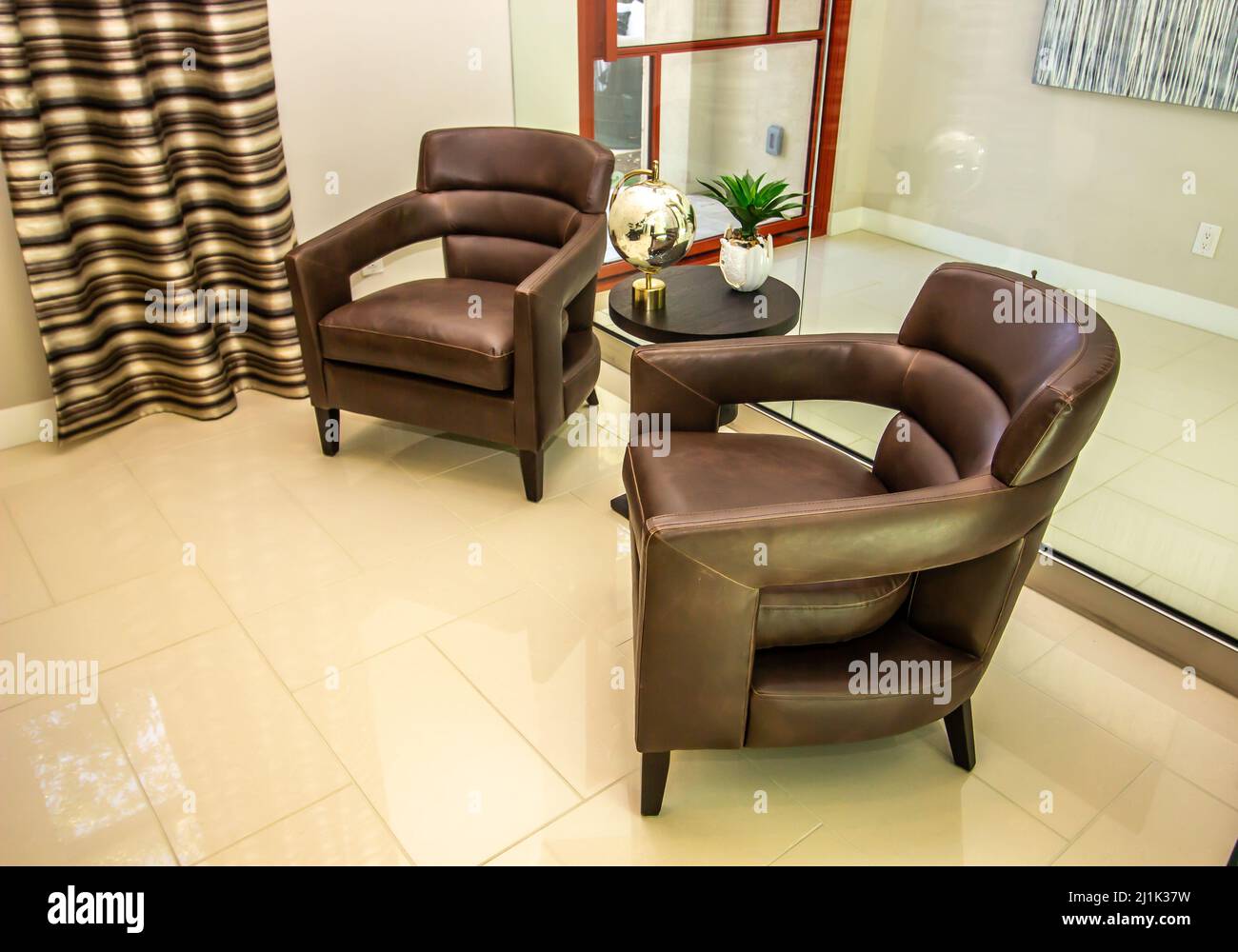 Two UShaped Upholstered Arm Chairs Stock Photo Alamy
