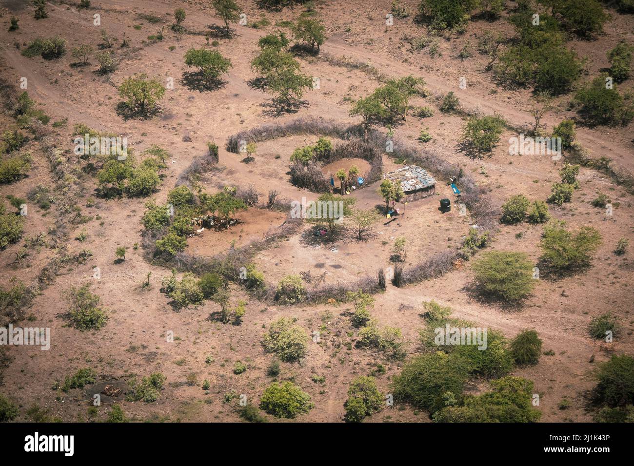 Aerial view of a traditional kraal, a round shaped, by fencing enclosed