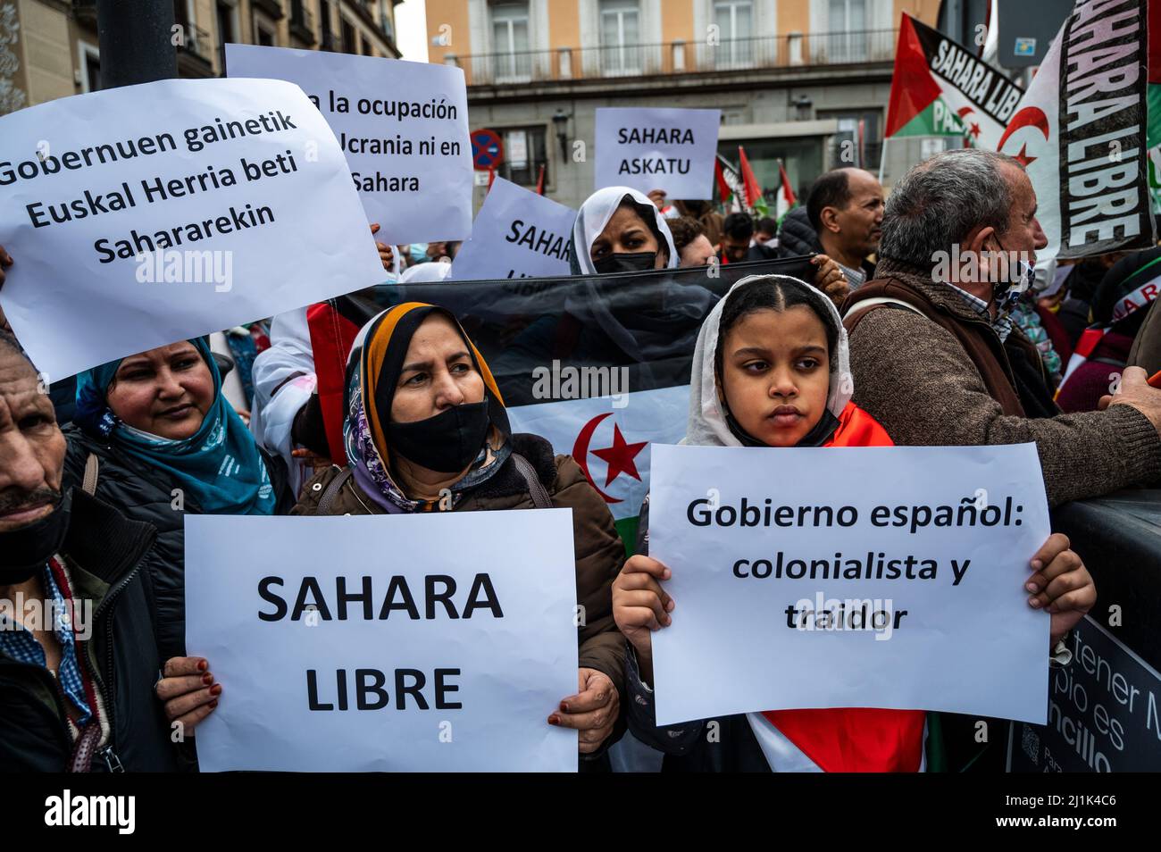 Madrid, Spain. 26th Mar, 2022. Saharawi community and supporters are seen with placards demanding freedom for the Western Sahara during a demonstration in front of the Ministry of Foreign Affairs. Thousands have gathered to protest against the Spanish government's support for Morocco's autonomy plan for Western Sahara, which grants a limited autonomy to Western Sahara. Pro-independence groups as well as Algeria oppose the proposal. Credit: Marcos del Mazo/Alamy Live News Stock Photo