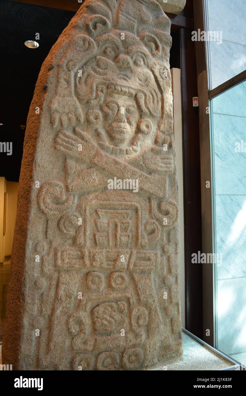 Stela Juquila Oaxaca. The character wears a large Jaguar headdress and crossed arms in the bottom it is read cartouche 3 Jaguar. Stock Photo