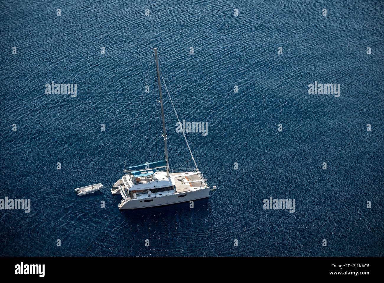 Sailing in Santorini Island Stock Photo