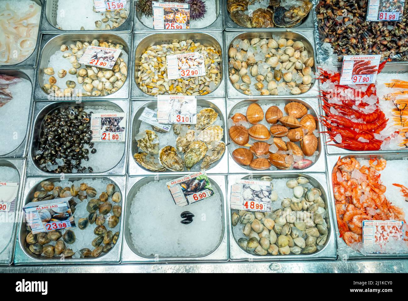 Fish seafood stall shop inside Mercado de la Paz, Salamanca, Madrid, Spain Stock Photo