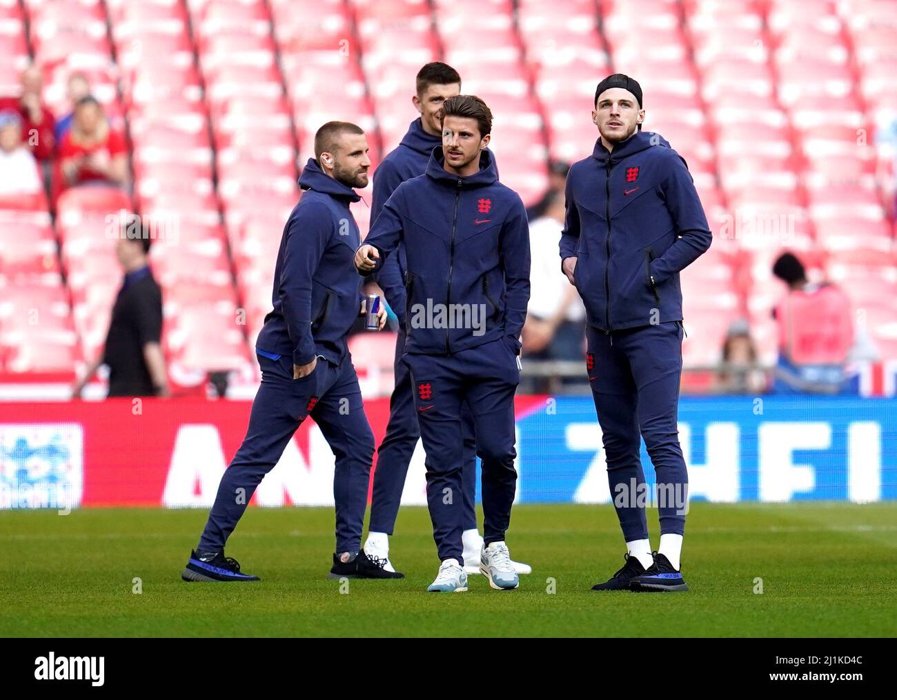 England's Luke Shaw (left), Mason Mount and Declan Rice inspect the pitch ahead of the Alzheimer's Society international match at Wembley Stadium, London. Picture date: Saturday March 26, 2022. Stock Photo