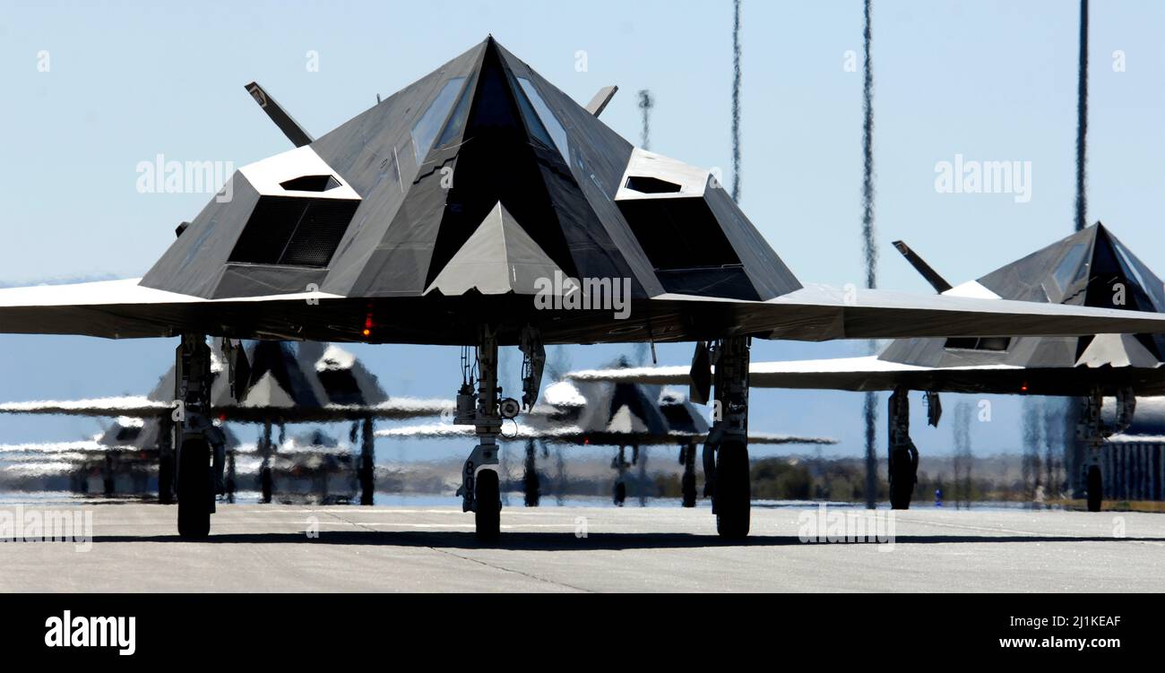 Holloman Air Force Base, United States. 28 October, 2006. Twenty-five U.S. Air Force F-117 Nighthawk stealth fighter aircraft line up for take-off to celebrate the 25th anniversary of the first combat stealth fighter at Holloman Air Force Base, June 8, 2012 in Alamogordo, New Mexico.  Credit: SrA Brian Ferguson/US Air Force/Alamy Live News Stock Photo
