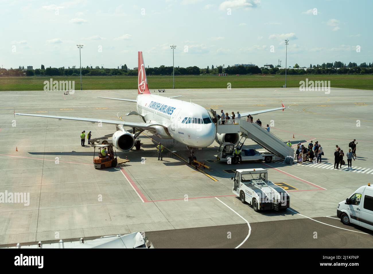 Ukraine, Odessa - August 3, 2021: At the ODS airport await departure. The plane Airbus A319-132 Turkish Airlines. Passengers go up the ladder to the plane. Stock Photo