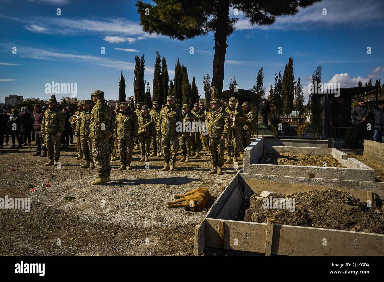 Tbilisi, Georgia. 26th Mar, 2022. Soldiers seen waiting for David Ratiani's body during the funeral ceremony. A farewell ceremony was held for David Beriashvili, a soldier who was shot dead in defence of Ukraine against the Russian attack, the funeral ceremony was held in central church of Tbilisi, Georgia where many gathered to support the soldier's family. Credit: SOPA Images Limited/Alamy Live News Stock Photo
