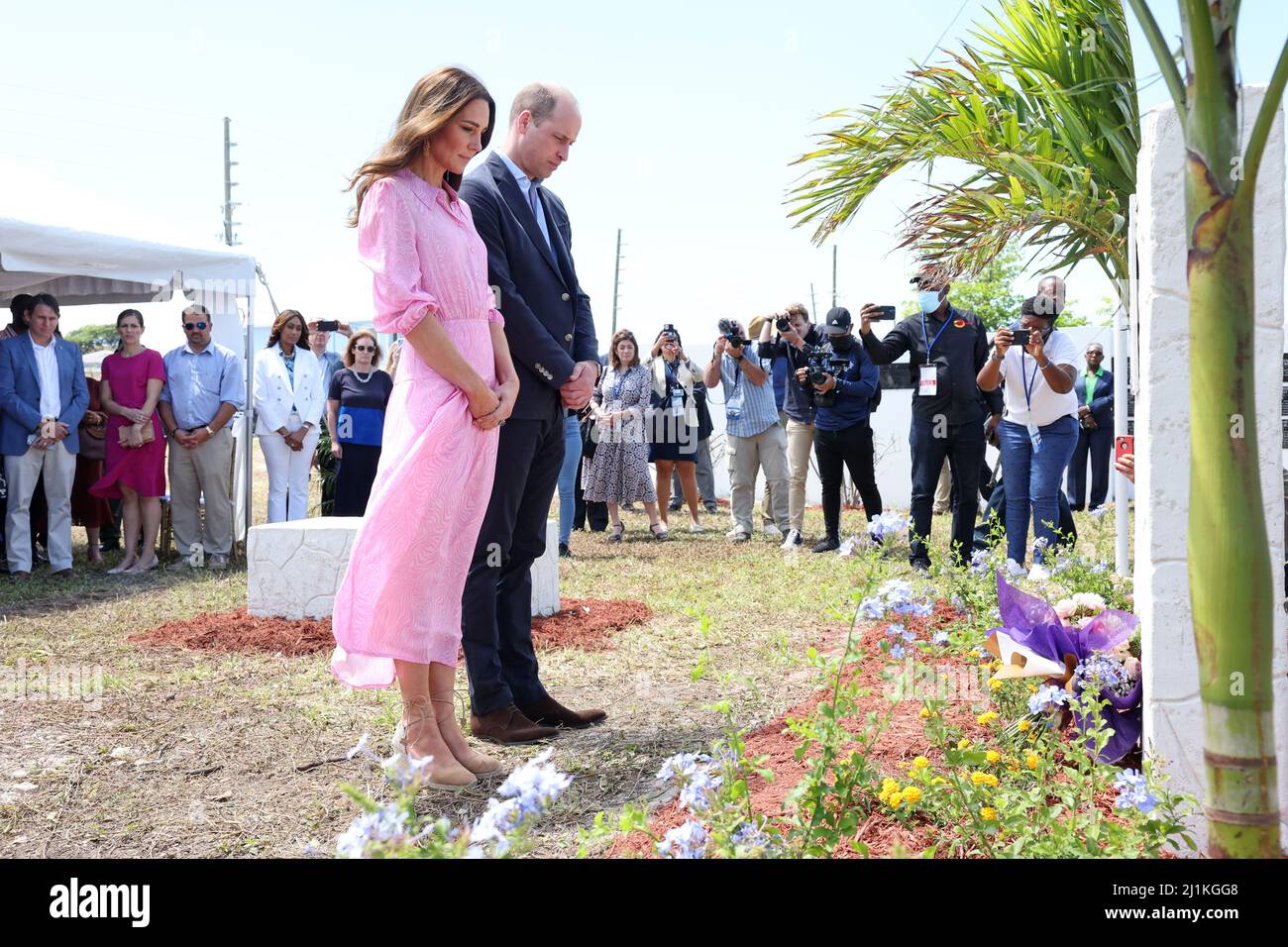 The Duke and Duchess of Cambridge during a visit to the Memorial Wall to remember victims of the 2019 hurricane at the Memorial Garden in Abaco, on day eight of their tour of the Caribbean on behalf of the Queen to mark her Platinum Jubilee. Abaco, a chain of islands and barrier cays in the northern Bahamas, was hit by winds of up to 185mph during Hurricane Dorian in 2019 leaving 75% of homes across the chain of islands damaged and resulting in tragic loss of life. Picture date: Saturday March 26, 2022. Stock Photo