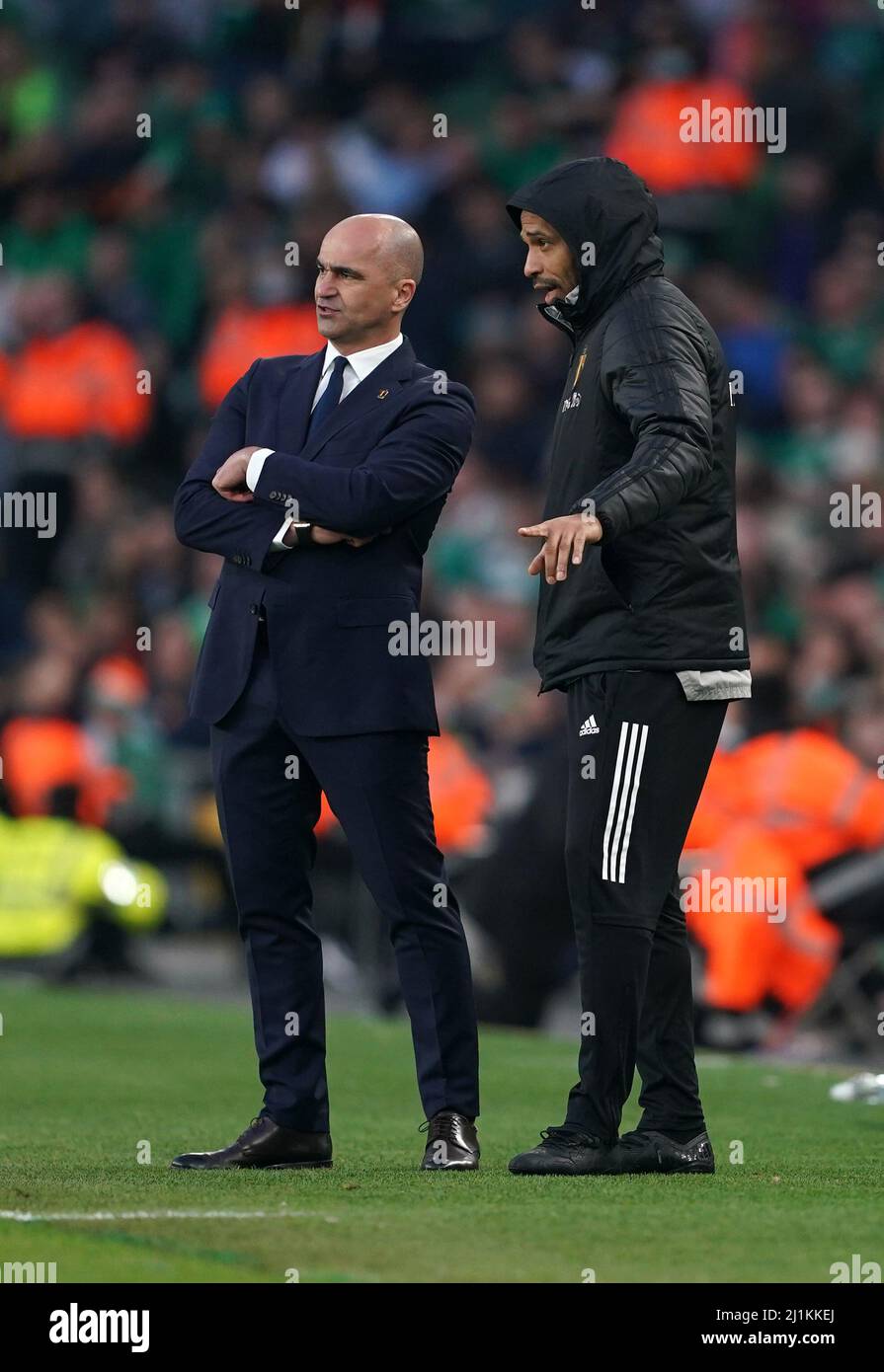 Belgium manager Roberto Martinez and assistant coach Thierry Henry (left) on the touchline during the international friendly match at the Aviva Stadium, Dublin. Picture date: Saturday March 26, 2022. Stock Photo