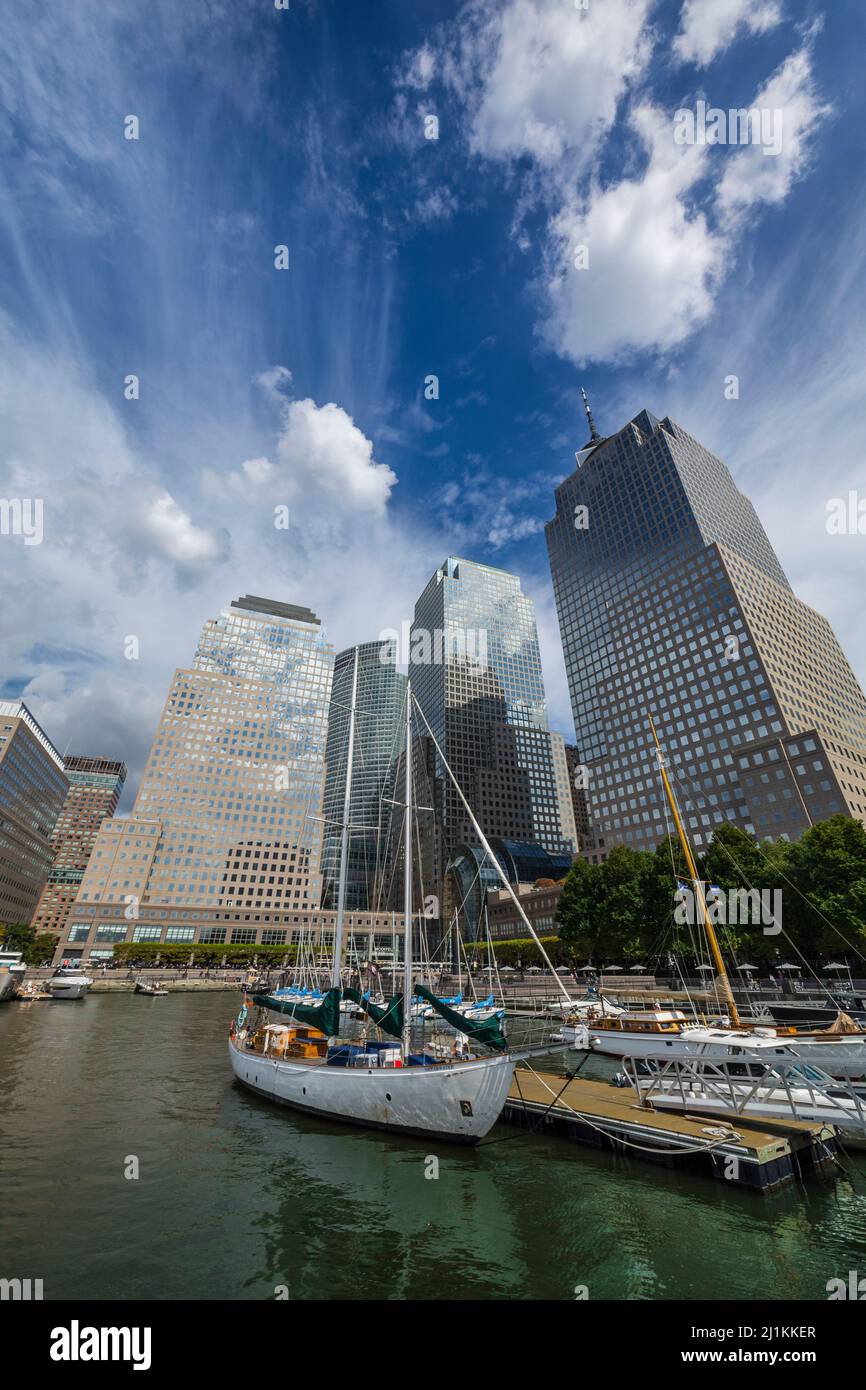 Yachts to anchor in North Cove Yacht Harbor along Brookfield NYC Stock