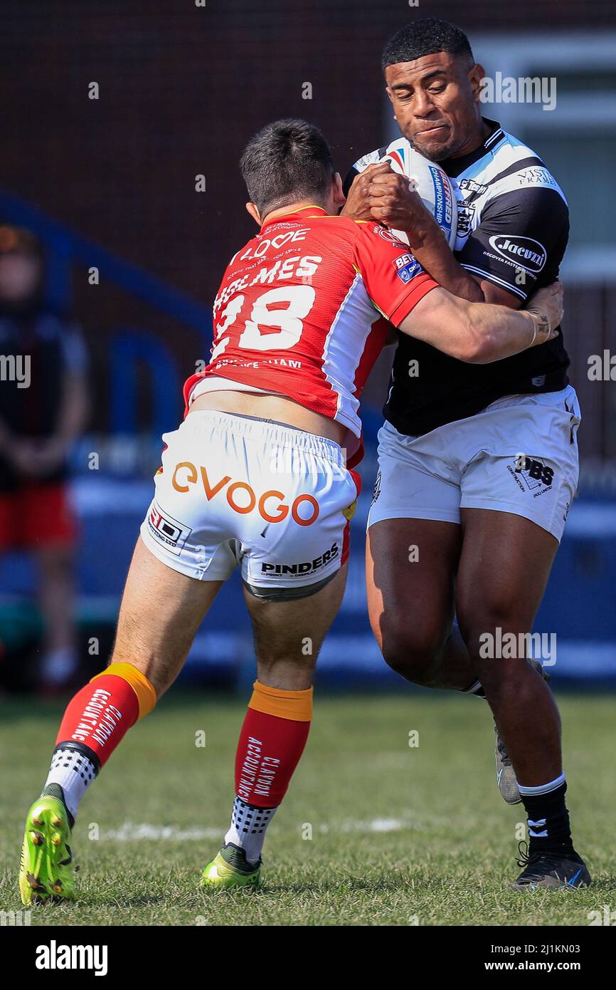 Featherstone, UK. 26th Mar, 2022. Joe Lovodua #14 of Hull FC is tackled by Matty Chrimes #28 of Sheffield Eagles in Featherstone, United Kingdom on 3/26/2022. (Photo by James Heaton/News Images/Sipa USA) Credit: Sipa USA/Alamy Live News Stock Photo
