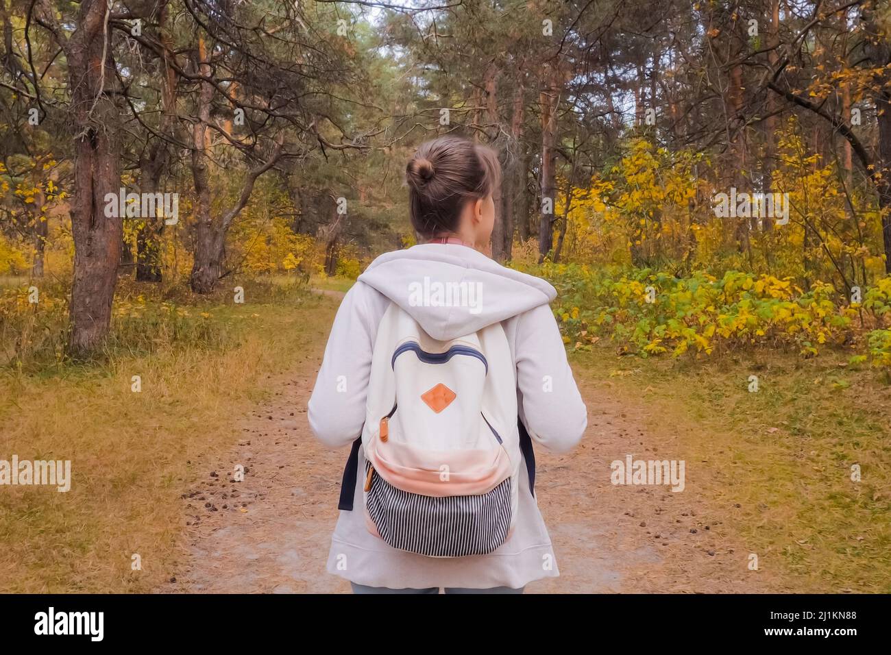 Back woman backpack autumn hi-res stock photography and images - Alamy