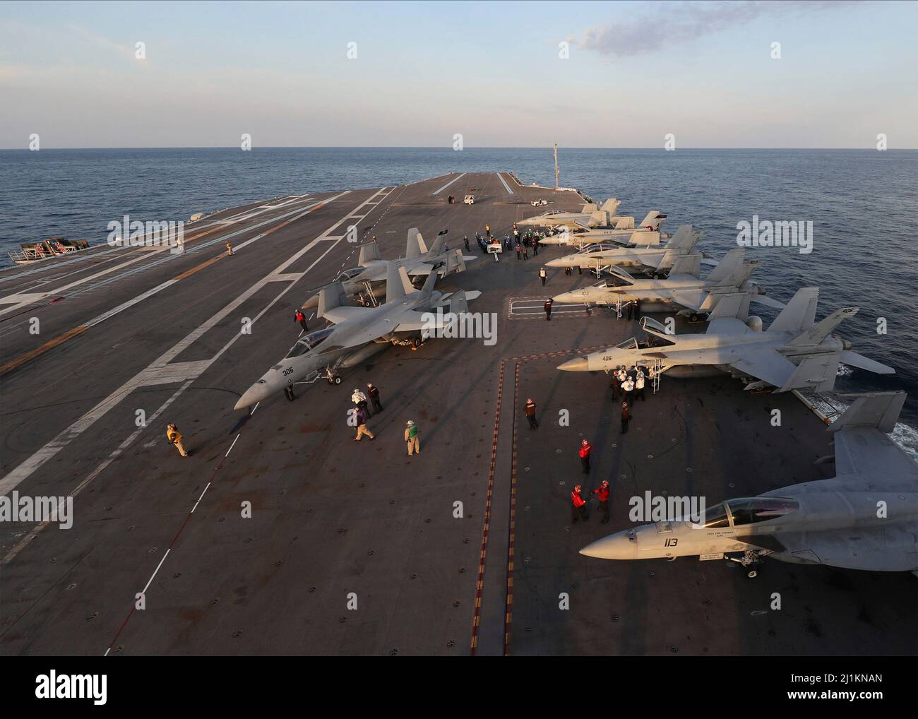 Atlantic Ocean, United States. 24 March, 2022. The U.S. Navy F/A-18 Super Hornet fighter aircraft attached to Carrier Air Wing 8 are positioned on the flight deck of the Ford-class aircraft carrier USS Gerald R. Ford underway during certification and qualifications, March 24, 2022 in the Atlantic Ocean.  Credit: MC2 Nolan Pennington/Planetpix/Alamy Live News Stock Photo