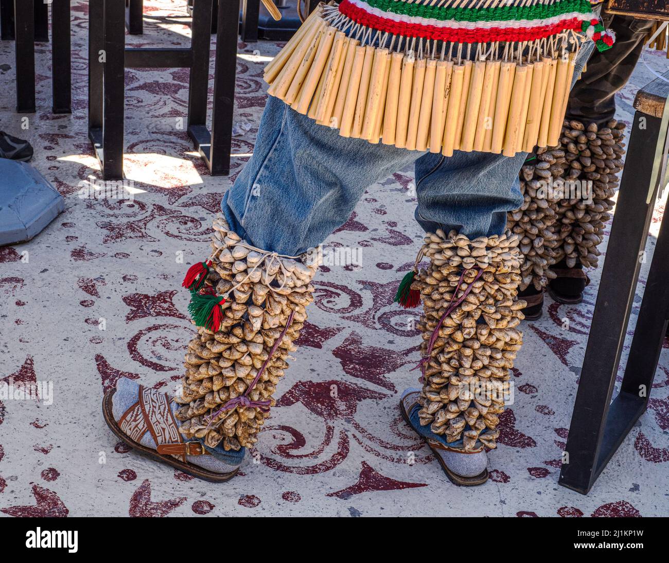 Fariseo dancers wearing hip rattles, cocoon rattles, blue jeans and sandals during 40 Days of Lent in San Carlos, Sonora, Mexico. Stock Photo