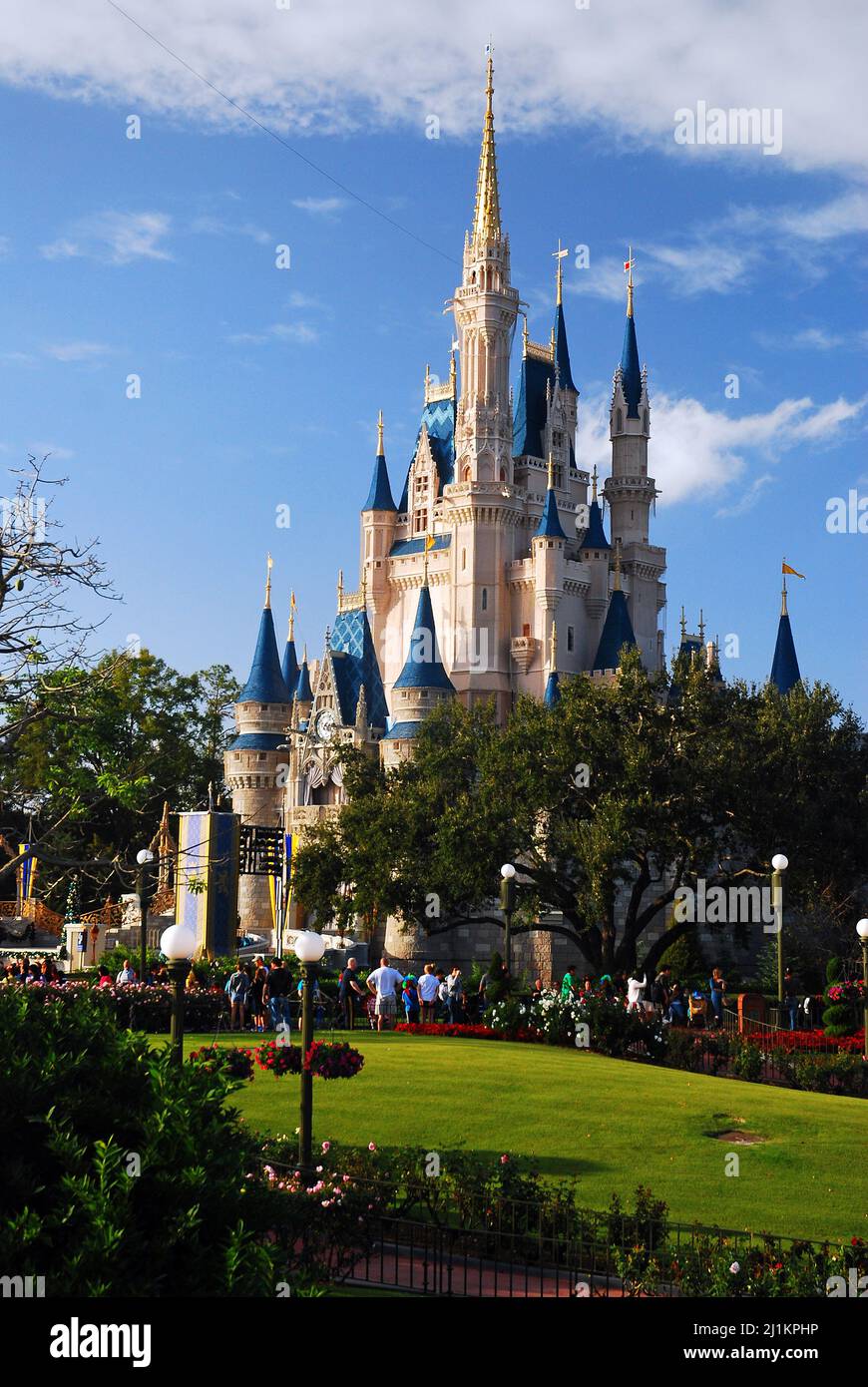 Cinderella’s Castle rises over the crowd in Disney World Stock Photo