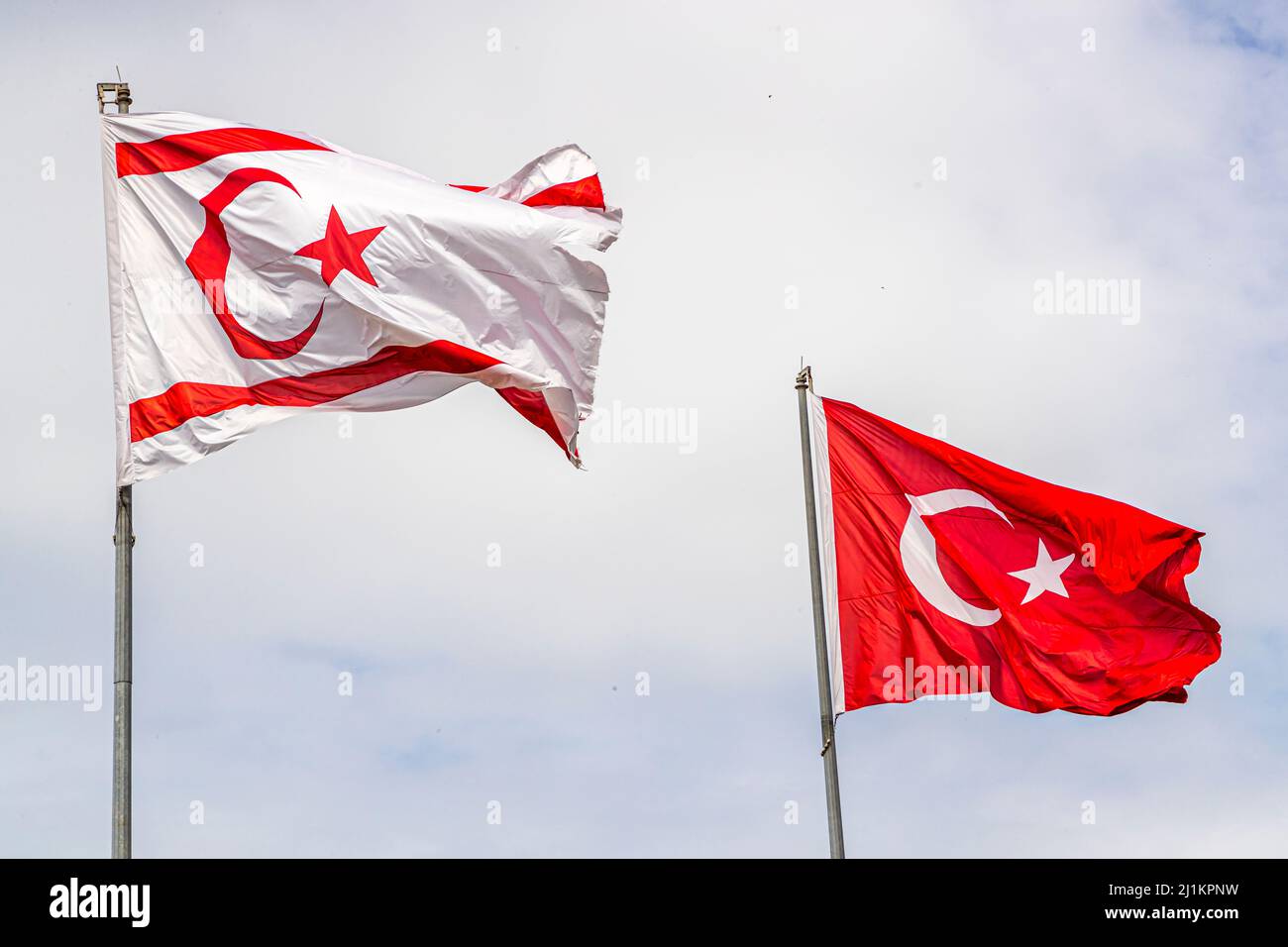The Northern Cyprus flag always flies next to the Turkish flag in the Turkish Republic of Northern Cyprus (TRNC) Stock Photo