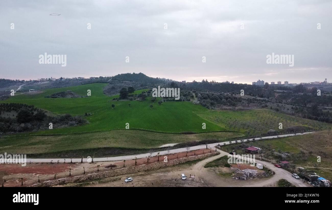 An aerial view of green hills in a rural area and a cloudy sky Stock ...