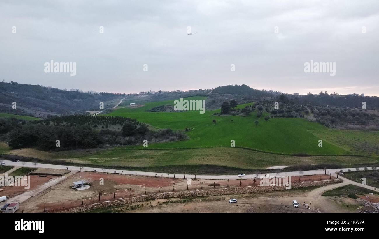 An aerial view of green hills in a rural area and a cloudy sky Stock ...