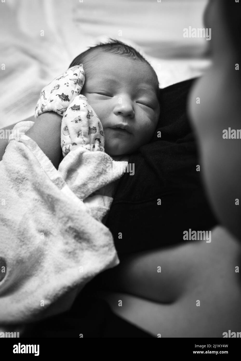 Newborn Baby only Hours Old in the Hospital Stock Photo