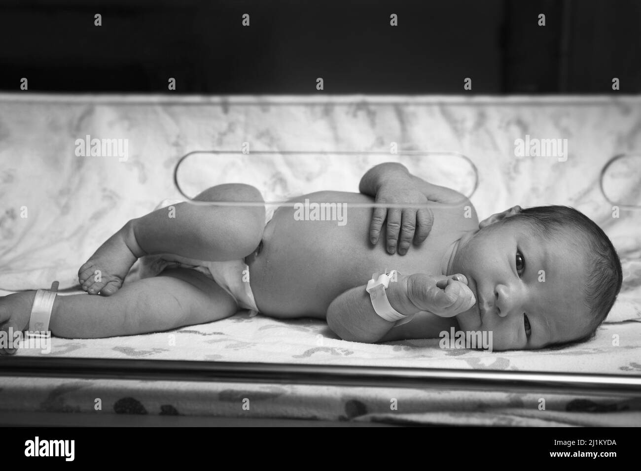 Newborn Baby only Hours Old in the Hospital Stock Photo