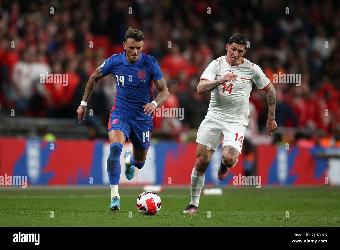 London, UK. 26th Mar, 2022. Ben White of England (l) runs past Steven Zuber of Switzerland. England v Switzerland, International football friendly designated Alzheimer's Society International match at Wembley Stadium in London on Saturday 26th March 2022. Editorial use only. pic by Andrew Orchard/Andrew Orchard sports photography/Alamy Live News Credit: Andrew Orchard sports photography/Alamy Live News Stock Photo