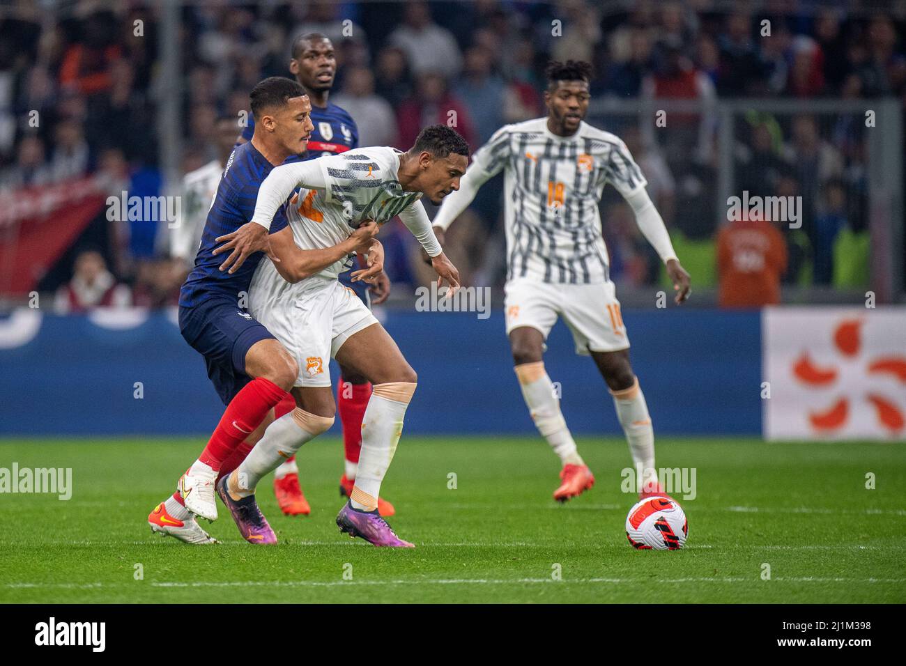 MARSEILLE, FRANCE - MARCH 25: Sebastien Haller of Ivory Coast and William Saliba of France during the international friendly match between France and Stock Photo