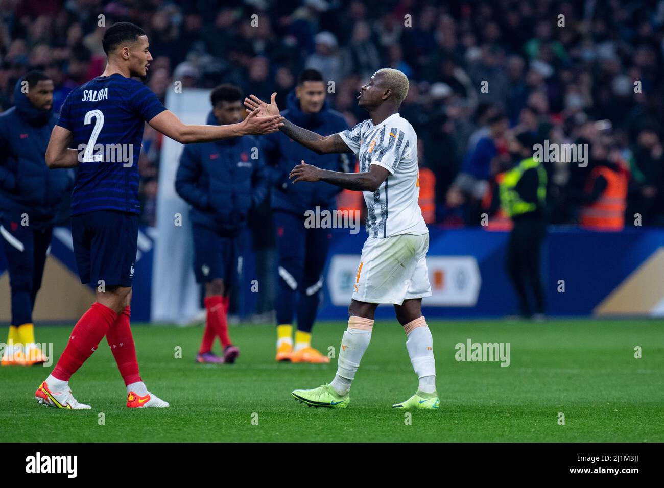MARSEILLE, FRANCE - MARCH 25: William Saliba of France and Jean Michael Seri of Ivory Coast during the international friendly match between France and Stock Photo