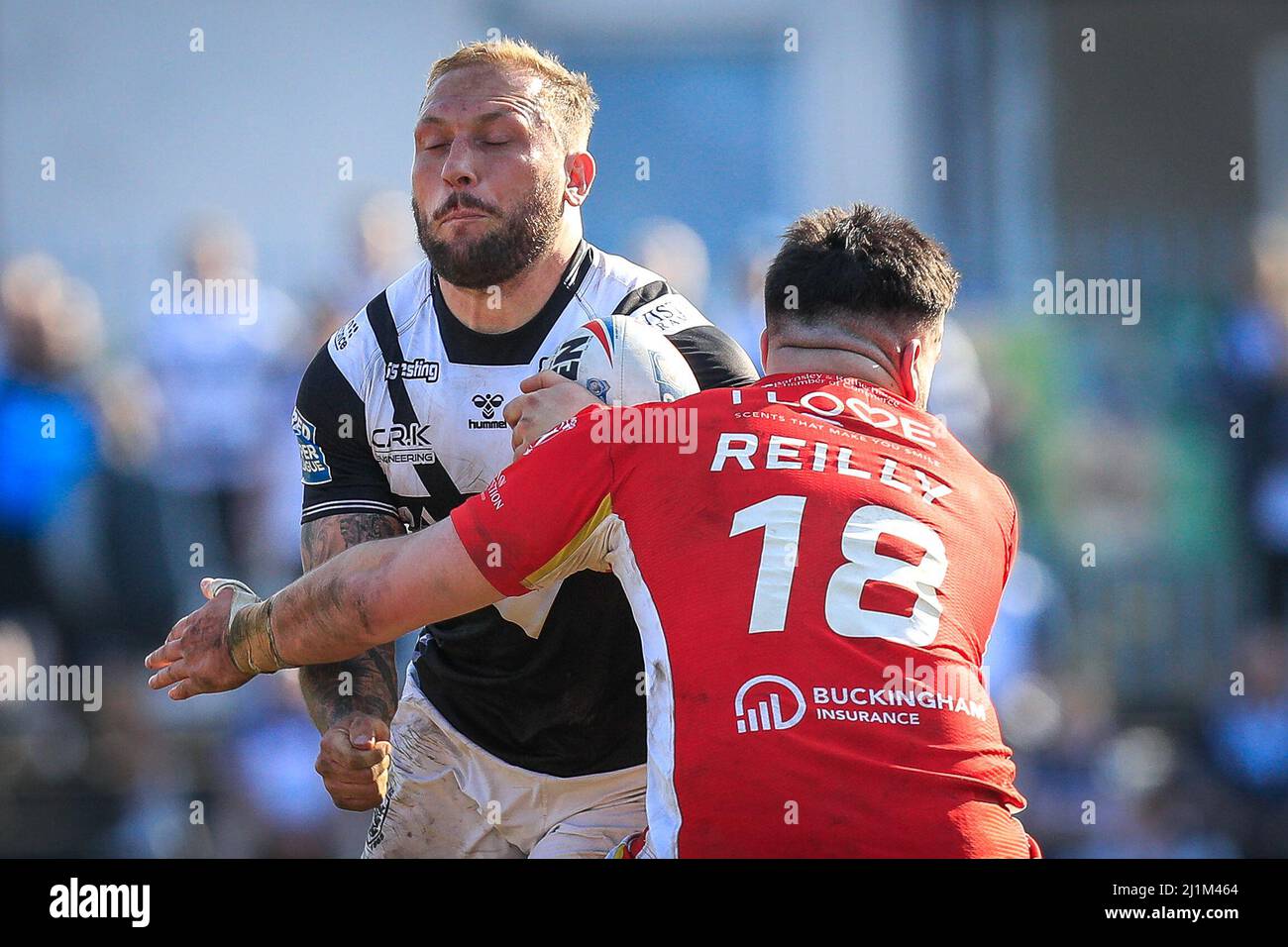 Featherstone, UK. 26th Mar, 2022. Josh Griffin #4 of Hull FC is tackled by Martin Reilly #18 of Sheffield Eagles in Featherstone, United Kingdom on 3/26/2022. (Photo by James Heaton/News Images/Sipa USA) Credit: Sipa USA/Alamy Live News Stock Photo