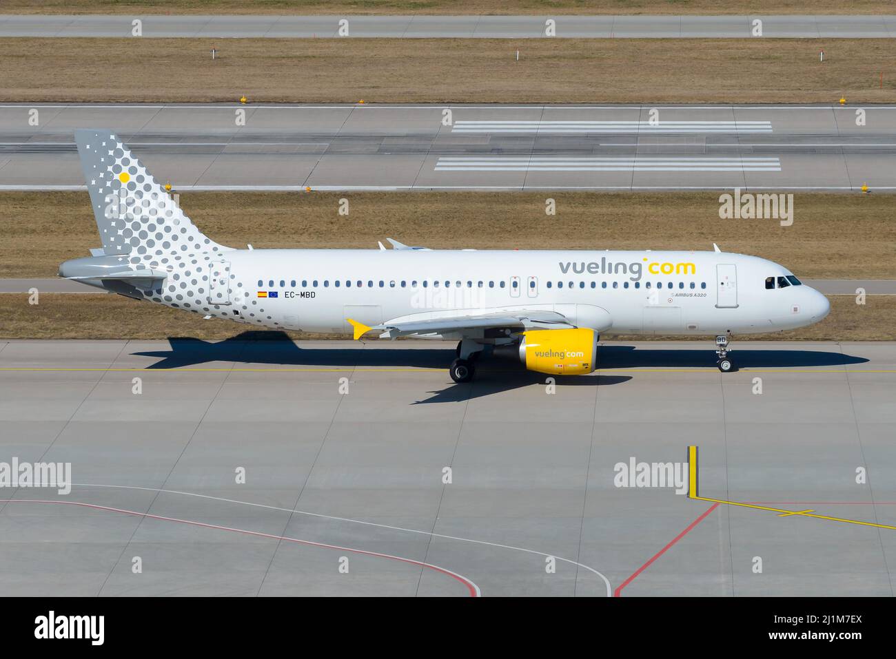 Vueling Airlines A320 airplane taxiing at Zurich Airport. Aircraft A320